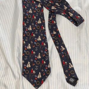 Navy blue nautical tie with anchors and sailboats